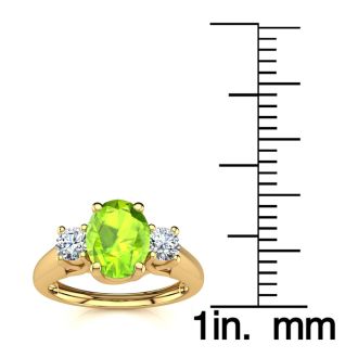 1 Carat Oval Shape Peridot and Two Diamond Ring In 14 Karat Yellow Gold