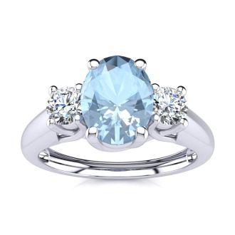 Aquamarine Ring: Aquamarine Jewelry: 1 Carat Oval Shape Aquamarine and Two Diamond Ring In 14 Karat White Gold
