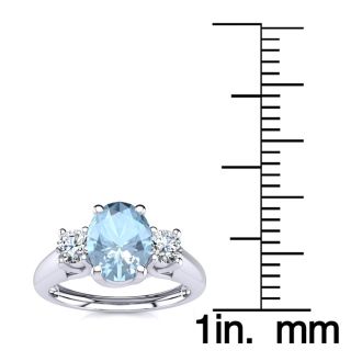 Aquamarine Ring: Aquamarine Jewelry: 1 Carat Oval Shape Aquamarine and Two Diamond Ring In 14 Karat White Gold
