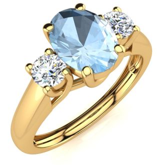 Aquamarine Ring: Aquamarine Jewelry: 1 Carat Oval Shape Aquamarine and Two Diamond Ring In 14 Karat Yellow Gold
