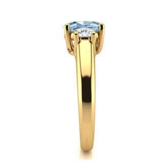 Aquamarine Ring: Aquamarine Jewelry: 1 Carat Oval Shape Aquamarine and Two Diamond Ring In 14 Karat Yellow Gold
