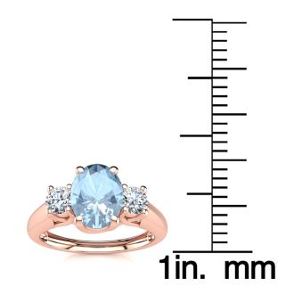 Aquamarine Ring: Aquamarine Jewelry: 1 Carat Oval Shape Aquamarine and Two Diamond Ring In 14 Karat Rose Gold