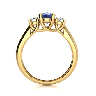 1.15 Carat Oval Shape Tanzanite and Two Diamond Ring In 14 Karat Yellow Gold