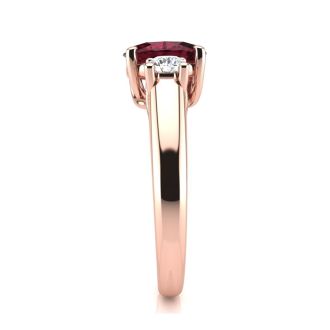 1 1/5 Carat Oval Shape Garnet and Two Diamond Ring In 14 Karat Rose Gold