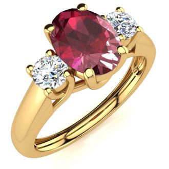 1.15 Carat Oval Shape Ruby and Two Diamond Ring In 14 Karat Yellow Gold