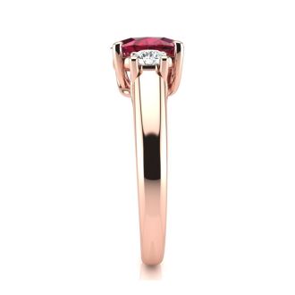 1.15 Carat Oval Shape Ruby and Two Diamond Ring In 14 Karat Rose Gold