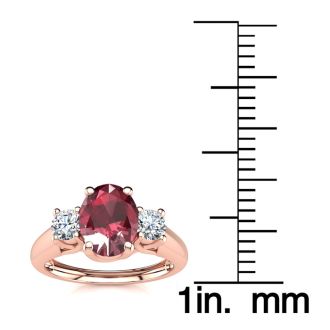 1.15 Carat Oval Shape Ruby and Two Diamond Ring In 14 Karat Rose Gold