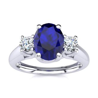 1 1/5 Carat Oval Shape Sapphire and Two Diamond Ring In 14 Karat White Gold