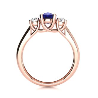 1 1/5 Carat Oval Shape Sapphire and Two Diamond Ring In 14 Karat Rose Gold