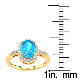 1 Carat Oval Shape Blue Topaz and Halo Diamond Ring In 14K Yellow Gold