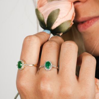 1 Carat Oval Shape Emerald and Halo Diamond Ring In 14K White Gold