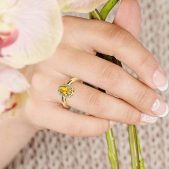 1/2 Carat Oval Shape Citrine and Halo Diamond Ring In 14K Yellow Gold
