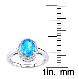 1 Carat Oval Shape Blue Topaz and Halo Diamond Ring In 14K White Gold
