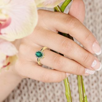 1 Carat Oval Shape Emerald and Halo Diamond Ring In 14K Yellow Gold