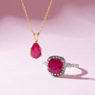 3 1/2 Carat Cushion Cut Ruby and Halo Diamond Ring In 14K White Gold