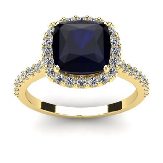 3 1/2 Carat Cushion Cut Sapphire and Halo Diamond Ring In 14K Yellow Gold