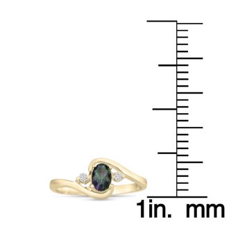 1/2 Carat Oval Shape Mystic Topaz Ring With Two Diamonds In 14 Karat Yellow Gold