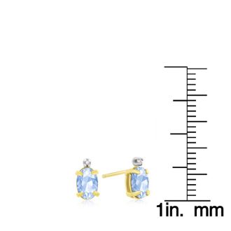1 1/4ct Oval Blue Topaz and Diamond Earrings in 14k Yellow Gold
