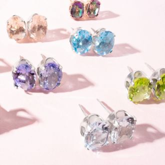 3 Carat Oval Shape Blue Topaz Stud Earrings In Sterling Silver