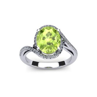 1 Carat Oval Shape Peridot and Halo Diamond Ring In 14 Karat White Gold