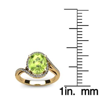 1 Carat Oval Shape Peridot and Halo Diamond Ring In 14 Karat Yellow Gold