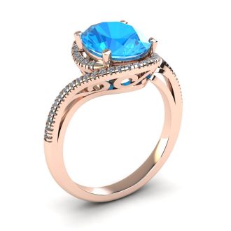 1 1/4 Carat Oval Shape Blue Topaz and Halo Diamond Ring In 14 Karat Rose Gold