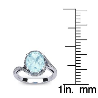 Aquamarine Ring: Aquamarine Jewelry: 1 Carat Oval Shape Aquamarine and Halo Diamond Ring In 14 Karat White Gold