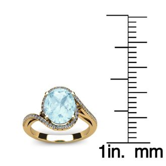 Aquamarine Ring: Aquamarine Jewelry: 1 Carat Oval Shape Aquamarine and Halo Diamond Ring In 14 Karat Yellow Gold