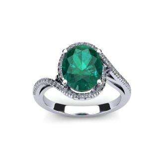 1 Carat Oval Shape Emerald and Halo Diamond Ring In 14 Karat White Gold