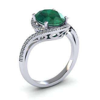 1 Carat Oval Shape Emerald and Halo Diamond Ring In 14 Karat White Gold