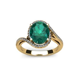 1 Carat Oval Shape Emerald and Halo Diamond Ring In 14 Karat Yellow Gold