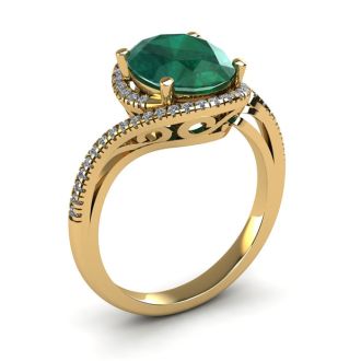 1 Carat Oval Shape Emerald and Halo Diamond Ring In 14 Karat Yellow Gold