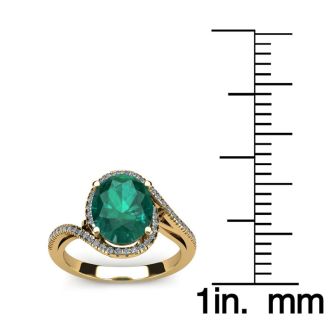 1 Carat Oval Shape Emerald and Halo Diamond Ring In 14 Karat Yellow Gold
