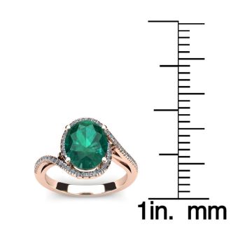 1 Carat Oval Shape Emerald and Halo Diamond Ring In 14 Karat Rose Gold