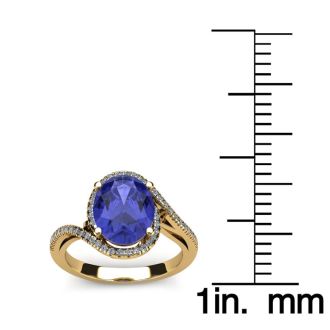 1 1/4 Carat Oval Shape Tanzanite and Halo Diamond Ring In 14 Karat Yellow Gold