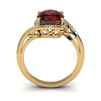 Garnet Ring: Garnet Jewelry: 1 1/4 Carat Oval Shape Garnet and Halo Diamond Ring In 14 Karat Yellow Gold