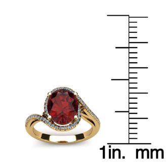 Garnet Ring: Garnet Jewelry: 1 1/4 Carat Oval Shape Garnet and Halo Diamond Ring In 14 Karat Yellow Gold