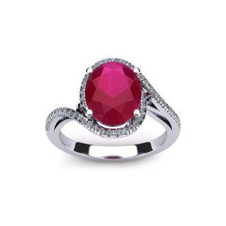 1 1/4 Carat Oval Shape Ruby and Halo Diamond Ring In 14 Karat White Gold