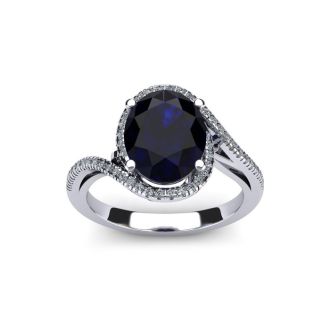 1 1/4 Carat Oval Shape Sapphire and Halo Diamond Ring In 14 Karat White Gold