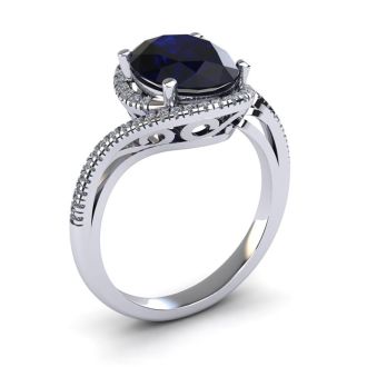 1 1/4 Carat Oval Shape Sapphire and Halo Diamond Ring In 14 Karat White Gold