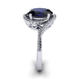1 1/4 Carat Oval Shape Sapphire and Halo Diamond Ring In 14 Karat White Gold