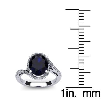 1 1/4 Carat Oval Shape Sapphire and Halo Diamond Ring In 14 Karat White Gold