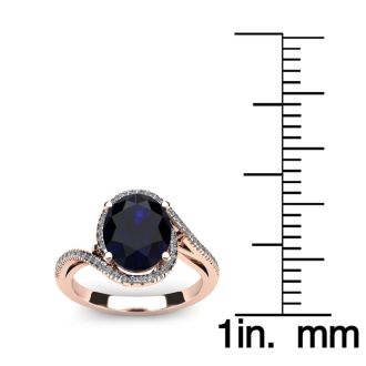 1 1/4 Carat Oval Shape Sapphire and Halo Diamond Ring In 14 Karat Rose Gold