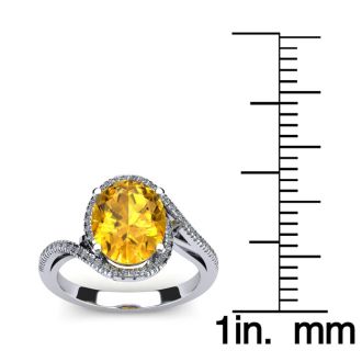 1 1/3 Carat Oval Shape Citrine and Halo Diamond Ring In 14 Karat White Gold