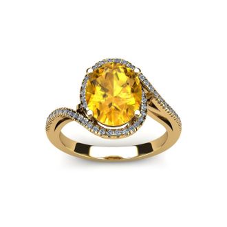 1 1/3 Carat Oval Shape Citrine and Halo Diamond Ring In 14 Karat Yellow Gold