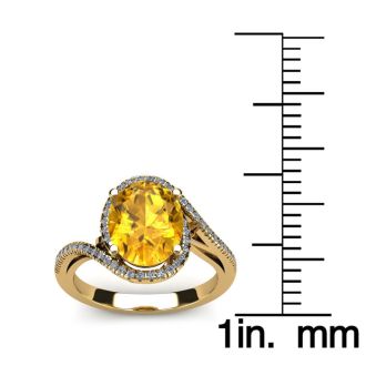 1 1/3 Carat Oval Shape Citrine and Halo Diamond Ring In 14 Karat Yellow Gold