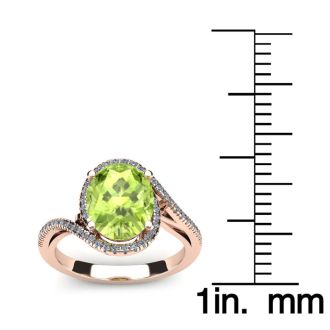 1 1/2 Carat Oval Shape Peridot and Halo Diamond Ring In 14 Karat Rose Gold