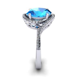 1 3/4 Carat Oval Shape Blue Topaz and Halo Diamond Ring In 14 Karat White Gold