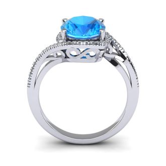 1 3/4 Carat Oval Shape Blue Topaz and Halo Diamond Ring In 14 Karat White Gold