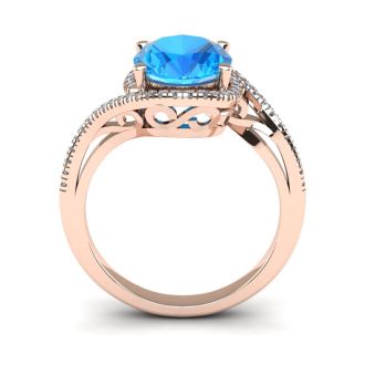 1 3/4 Carat Oval Shape Blue Topaz and Halo Diamond Ring In 14 Karat Rose Gold